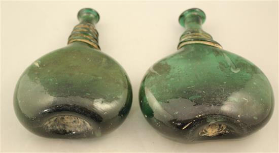 Two Persian green glass saddle flasks, 18th / 19th century, 23cm.